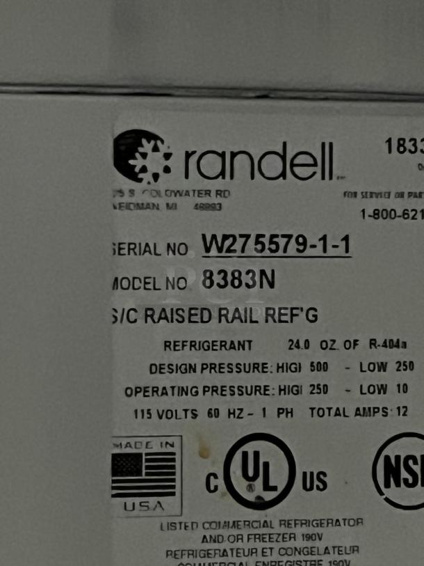 Randell 8383N pizza prep table label; model, serial number, refrigerant details. 115V, UL and NSF certified. Made in USA.