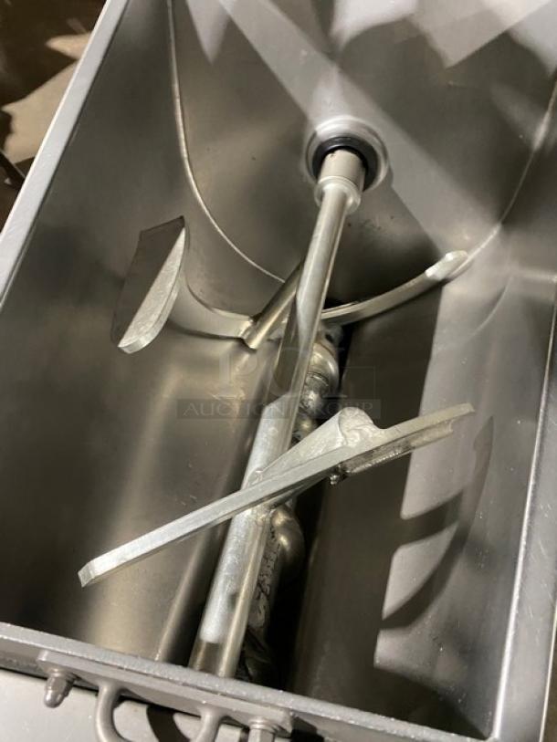 Hobart MG1532-1 meat mixer/grinder, 150 lb capacity, air-drive foot switch, stainless steel interior, on casters, excellent condition.