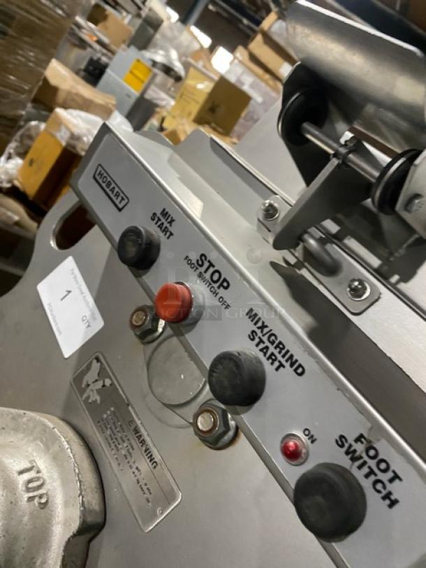 Hobart MG1532-1 commercial meat mixer/grinder with 150 lb capacity, air-drive foot switch, and control panel.