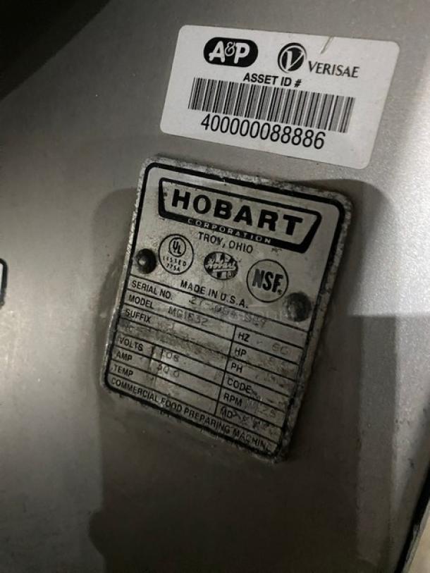 Hobart MG1532-1 meat mixer/grinder, 150 lb capacity, with air-drive foot switch, on casters, 208V 3-phase, asset tag visible.