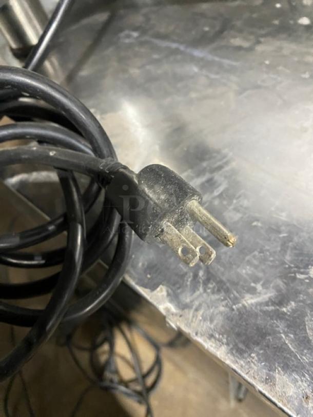 Electric plug of Hobart Commercial Food Processor Model 84145. Visible wear, 115V 1 Phase plug.