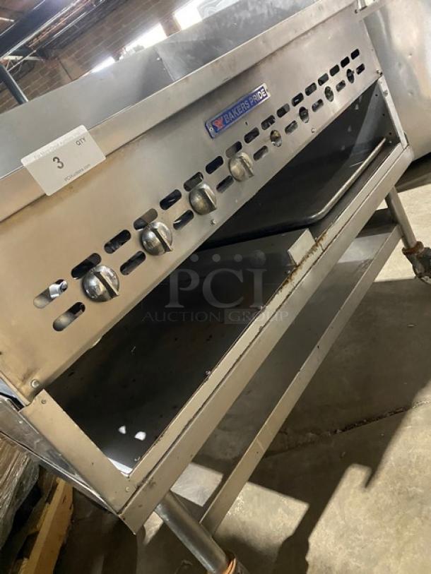 Bakers Pride stainless steel gas char broiler with back and side splash, single undershelf, on casters.