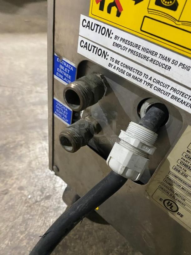 Taylor CH03-27 gelato machine, stainless, digital controls, model CH0327, 208-230V, 1 phase, on casters, with caution labels.