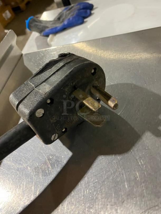 Electric plug for Taylor CH03-27 stainless gelato machine. Features durable black casing, 208-230V, 1 Phase.