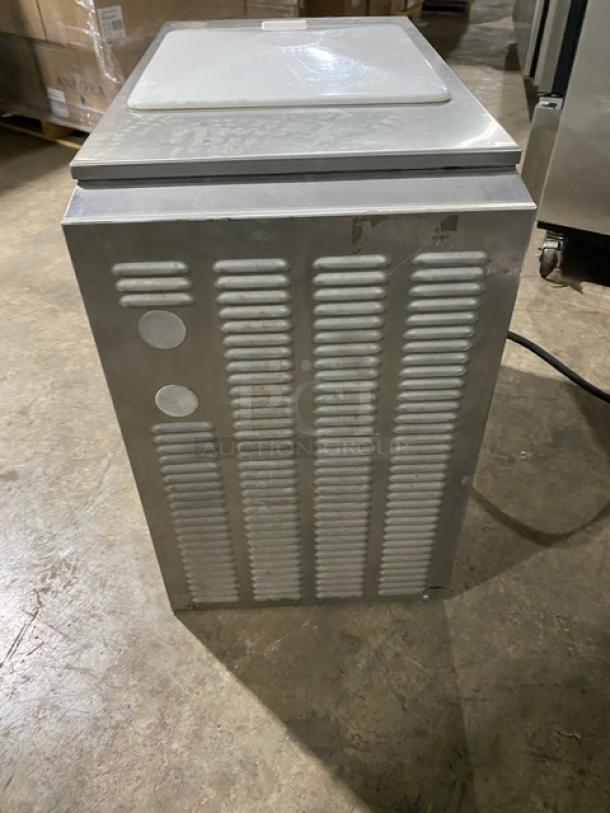 Coldelite UC1131G stainless steel twin/twist soft serve machine with 2 hoppers, electric-powered, shown on a warehouse floor.