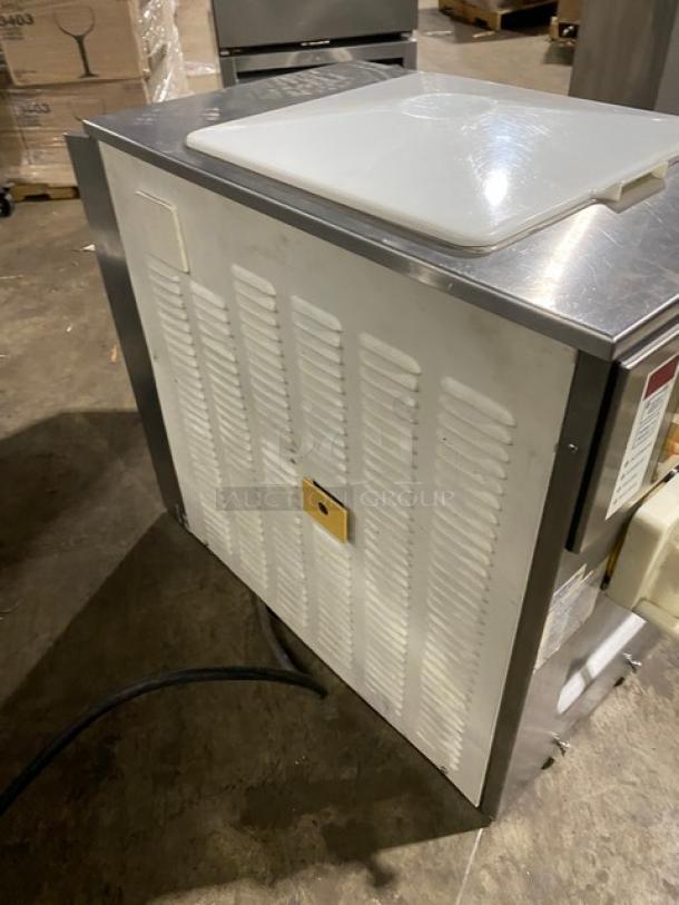 Coldelite UC1131G stainless steel soft serve machine, countertop model with 2 hoppers, 208-230V, 1 Phase, in used condition.