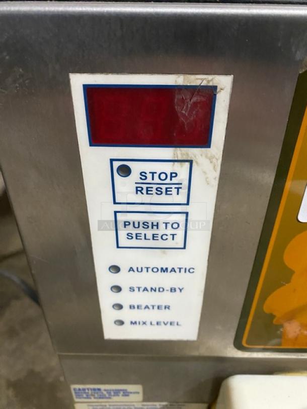 Coldelite UC1131G soft serve machine, stainless steel, with control panel showing "Stop Reset" and "Push to Select" buttons.