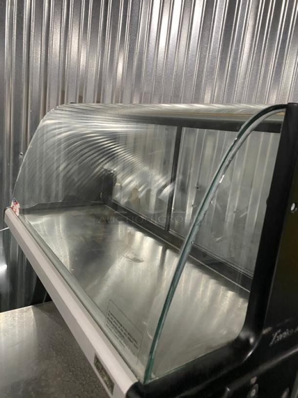 Turbo Air TOM-30LB refrigerated merchandiser with stainless steel interior, dry display case, and sliding doors, 120V 1 Phase.