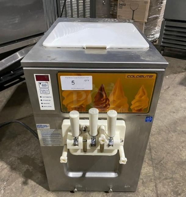 Coldelite UC1131G stainless steel soft serve machine, twin/twist model with 2 hoppers, 208-230V, 1 phase.
