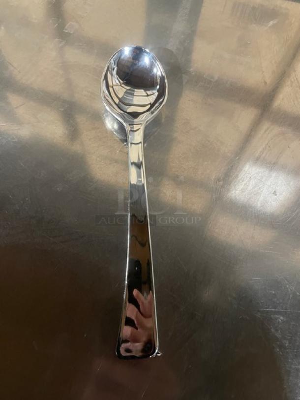 Yoshi Glimmerware 10" heavy-duty plastic serving spoon, high gloss silver, model EMI-GWSP10. New condition.
