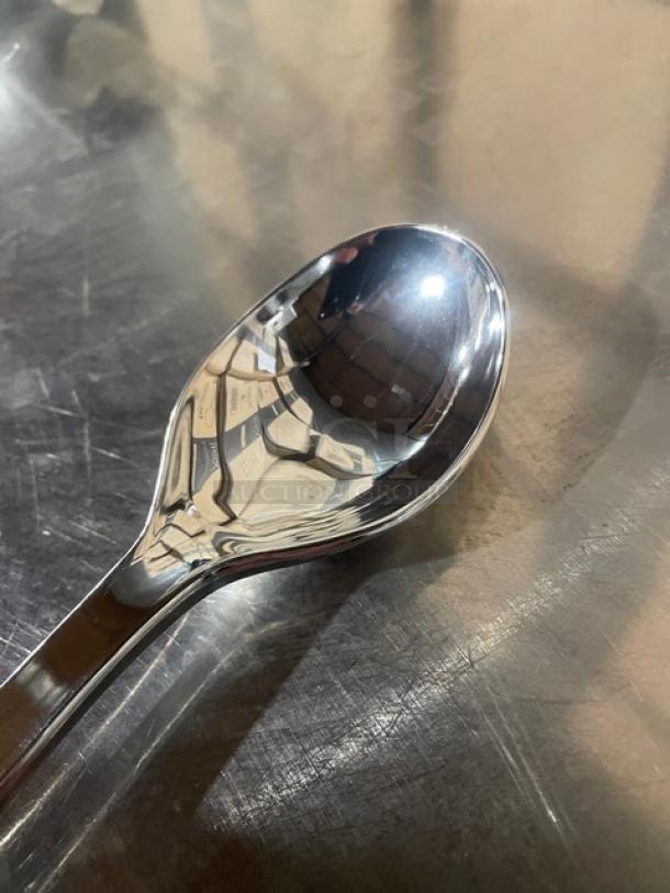 Yoshi Glimmerware Series 10" high-gloss silver disposable serving spoon, model EMI-GWSP10, new condition.