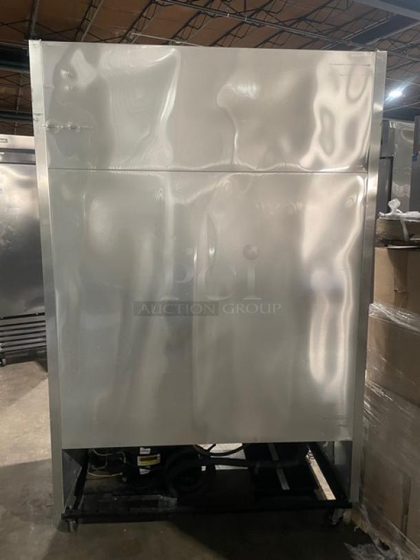 True T-49F stainless steel 2-door reach-in freezer, Energy Star certified, with poly-coated wired racks, on casters.