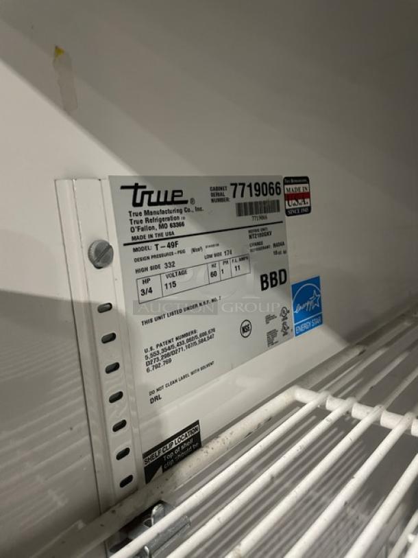 True T-49F 2-Door Reach-In Freezer, stainless steel, Energy Star certified, poly coated racks, model label shown, on casters.