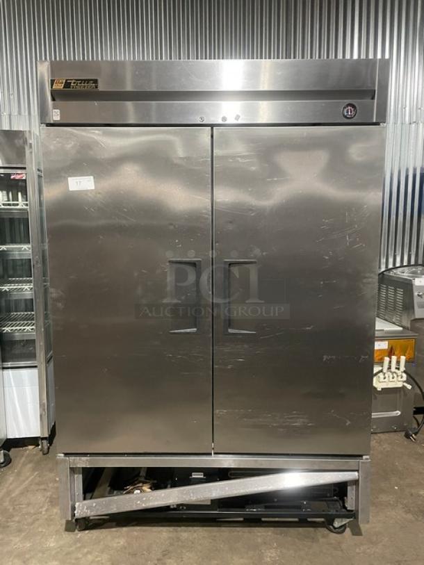 True T-49F stainless steel 2-door reach-in freezer on casters, with poly-coated wire racks, 115V, 1 phase, SN: 8493819.
