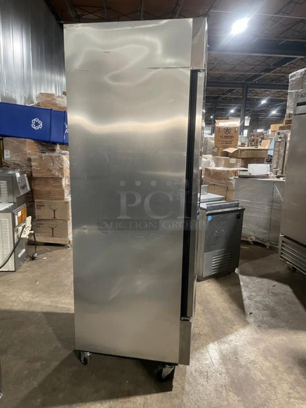 True T-23F commercial stainless steel single door reach-in freezer, Energy Star certified, on casters, with poly-coated wired rack.