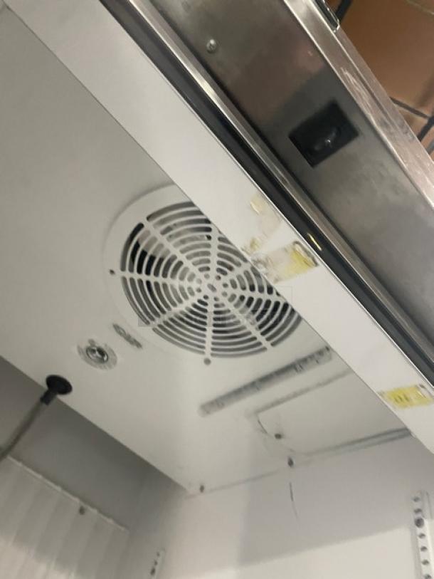 True T-23F stainless steel reach-in freezer, Energy Star certified, with poly coated rack, 115V, 1 phase, on casters.