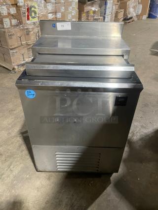 Commercial stainless steel bottle/glass chiller in good condition, with front ventilation and blue storage sticker, ideal for bars.