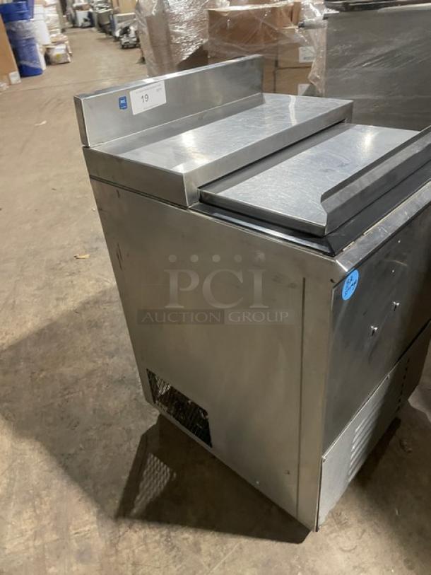 Commercial stainless steel bottle/glass chiller, two sliding lids, used condition, ID tag "19", durable for bar use.