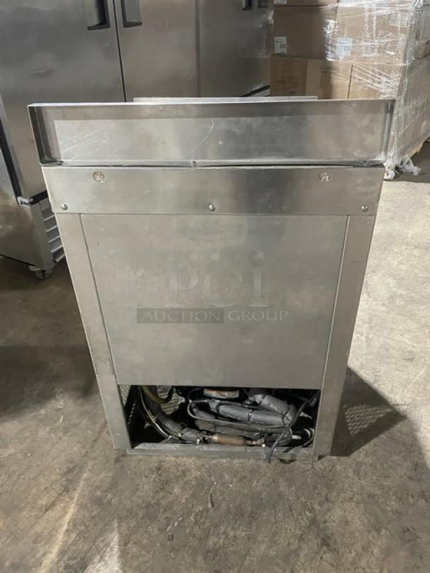 Commercial stainless steel bottle/glass chiller in good condition, featuring durable construction and visible cooling components.