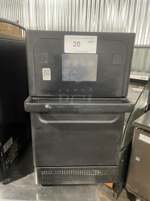 MerryChef black electric countertop high-speed rapid cook oven, late model, commercial use, visible control panel and label on top.