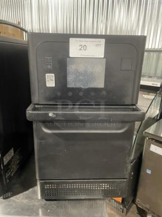 MerryChef black electric countertop high-speed rapid cook oven, late model, commercial use, visible control panel and label on top.