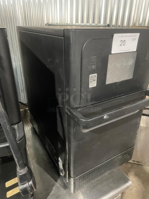 MerryChef black countertop high-speed rapid cook oven, electric-powered, late model, with visible digital panel and minor wear.