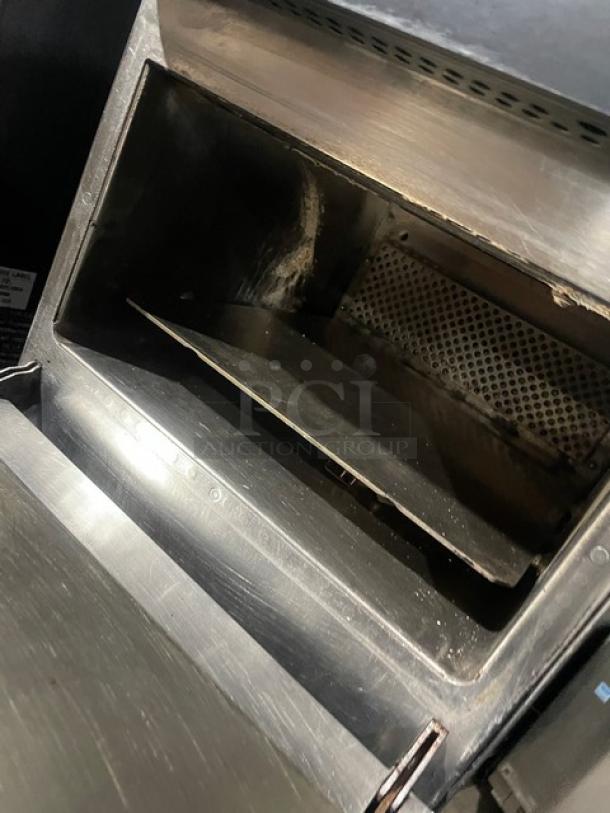 MerryChef high-speed rapid cook oven, black, electric countertop model, gently used, interior view showing cooking chamber.