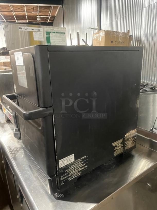 MerryChef late model black electric countertop high-speed rapid cook oven, visible labels, in good condition.