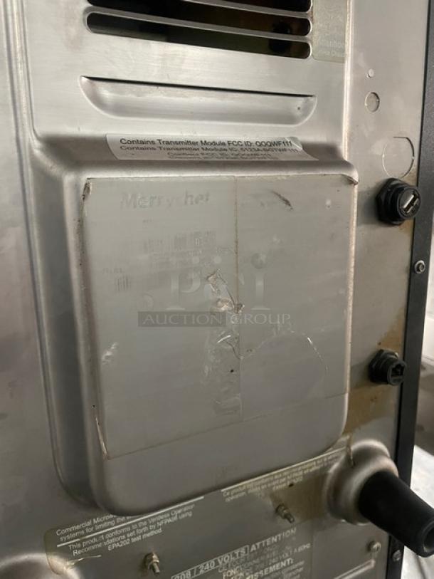 MerryChef commercial countertop rapid cook oven, black, electric powered, used condition, model markings visible.