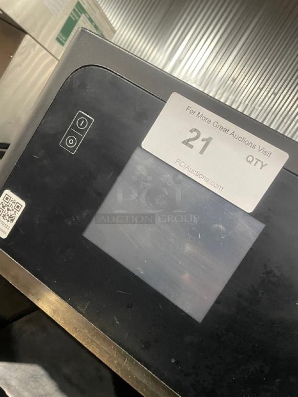 MerryChef commercial black electric rapid cook oven, late model, countertop, touchscreen, QR code, tag with “21 QTY”.