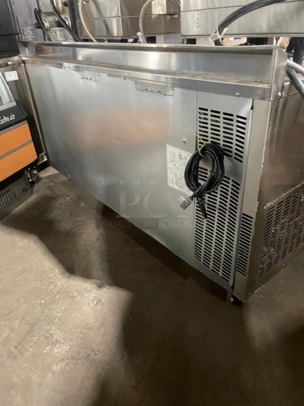 Everest Refrigeration ETRF3 stainless steel undercounter worktop table with poly coated rack, 115V, on casters, excellent condition.