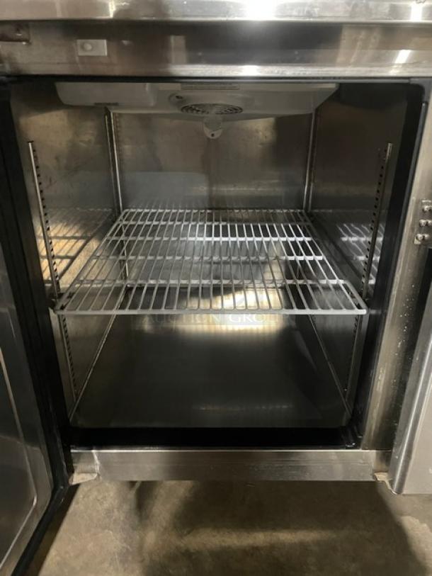 Everest Refrigeration ETRF3 stainless steel undercounter fridge with poly-coated wire rack, on casters. Model: ETRF3.