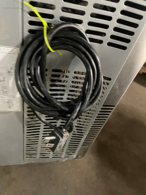 Everest Refrigeration ETRF3 undercounter worktop table, stainless steel, with poly-coated wired rack, on casters, 115V, 1 phase.