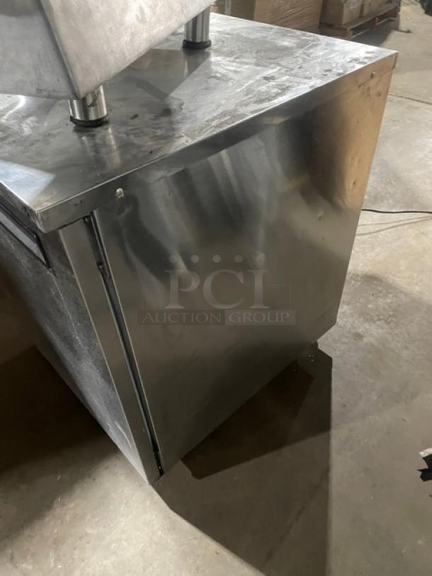 Delfield stainless steel undercounter refrigerator, model 406-STAR2. Features poly-coated wire rack. 115V, 1 Phase.