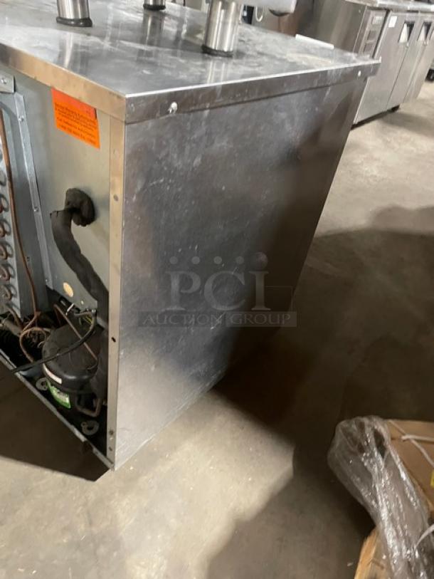 Delfield 406-STAR2 stainless steel undercounter refrigerator, visible wiring, and poly coated rack, 115V, used condition.