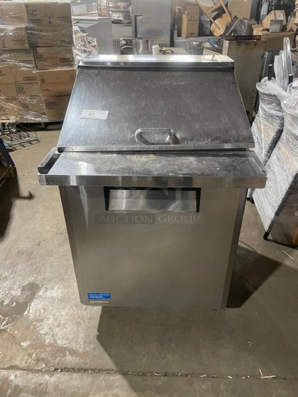 Turbo Air MST-28-12 refrigerated prep table, stainless steel, single door, on casters, used, includes label with serial number.
