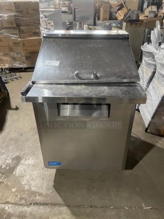 Turbo Air MST-28-12 refrigerated prep table, stainless steel, single door, on casters, used, includes label with serial number.