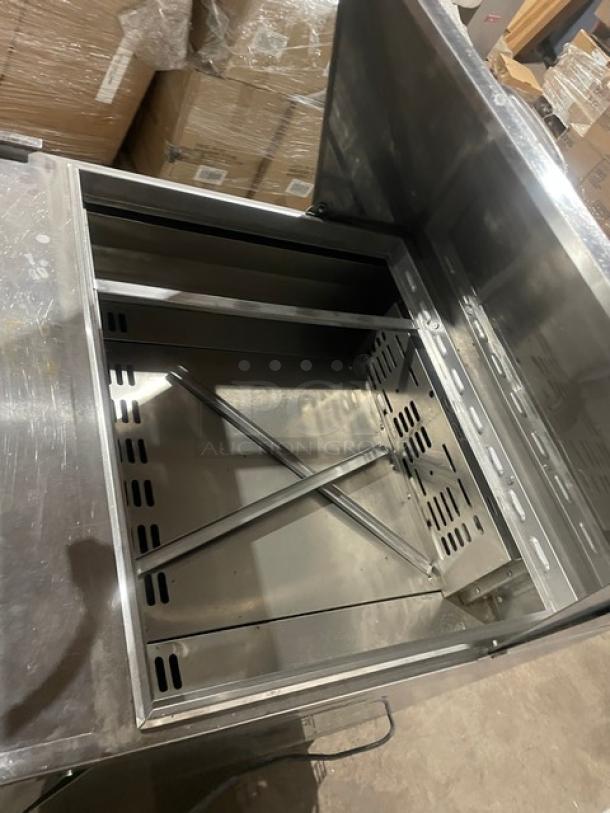 Turbo Air M3 Series refrigerated prep table, Model MST-28-12, stainless steel, single door, Bain Marie style, on casters.