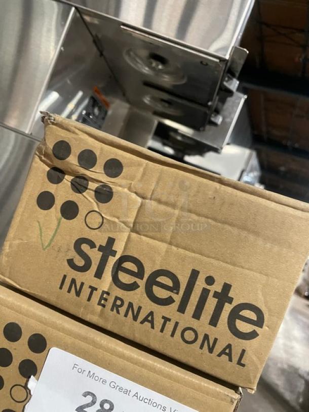 Steelite International box containing new Ink Legacy Teal Collection 6" round coupe plates, model 17650568, alumina-vitrified china.