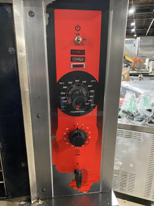 Vulcan commercial stainless steel gas double convection oven, red control panel, wired rack, on legs, used condition.