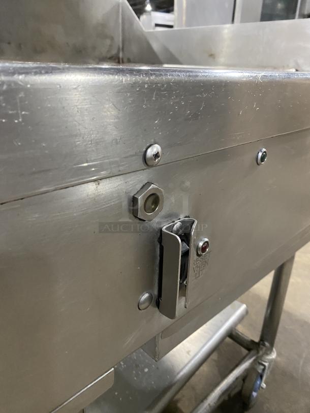 WoodStone stainless steel natural gas countertop plancha griddle with back and side splash, on a welded stand with casters.