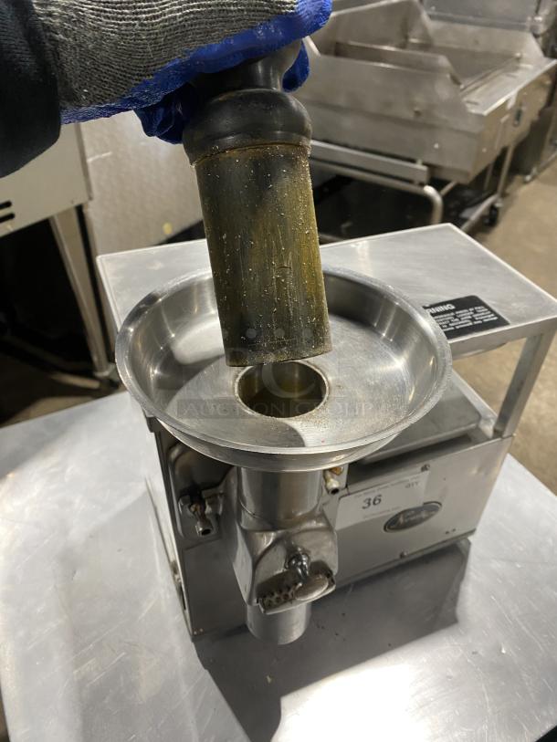 Norwalk Model 275SS commercial stainless steel two-stage juicing machine, features hydraulic press, minor wear, 100/240V.