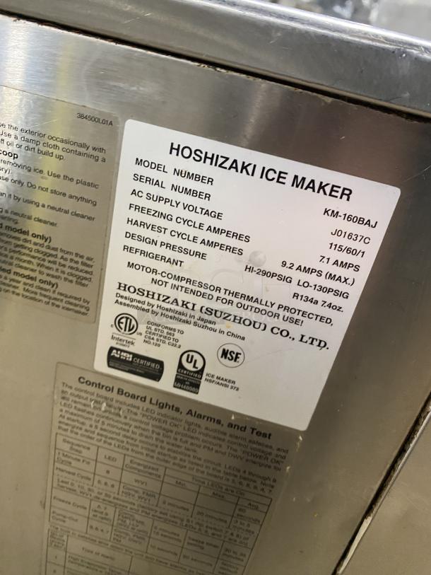 Hoshizaki KM-160BAJ commercial ice maker, stainless steel, air-cooled, crescent-cube style, model number label visible.