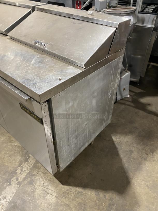 Continental SW72-18 stainless steel 3-door refrigerated prep table, with poly-coated wire rack, on casters, model SN 15238337.