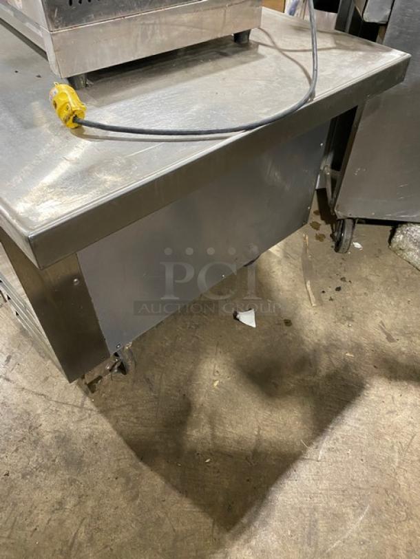 Beverage-Air stainless steel refrigerated chef base, model WTRCS36148, with oversized worktop, two drawers, on casters.