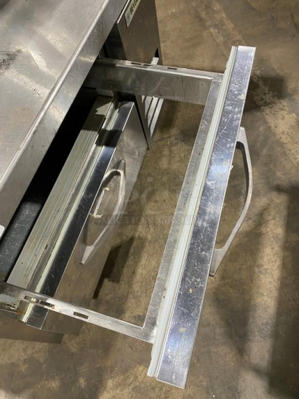 Beverage-Air stainless steel 2-drawer chef base, model WTRCS36148, in good condition, on casters, with extended worktop.