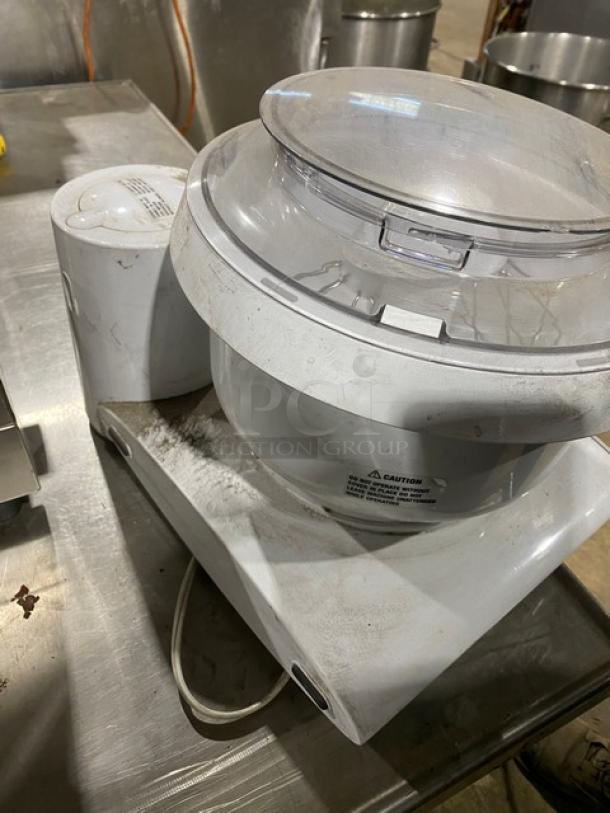 Bosch Universal Plus Stand Mixer, Model MUM6N10UC/03, white, electric powered, countertop design, visible wear, 120V.