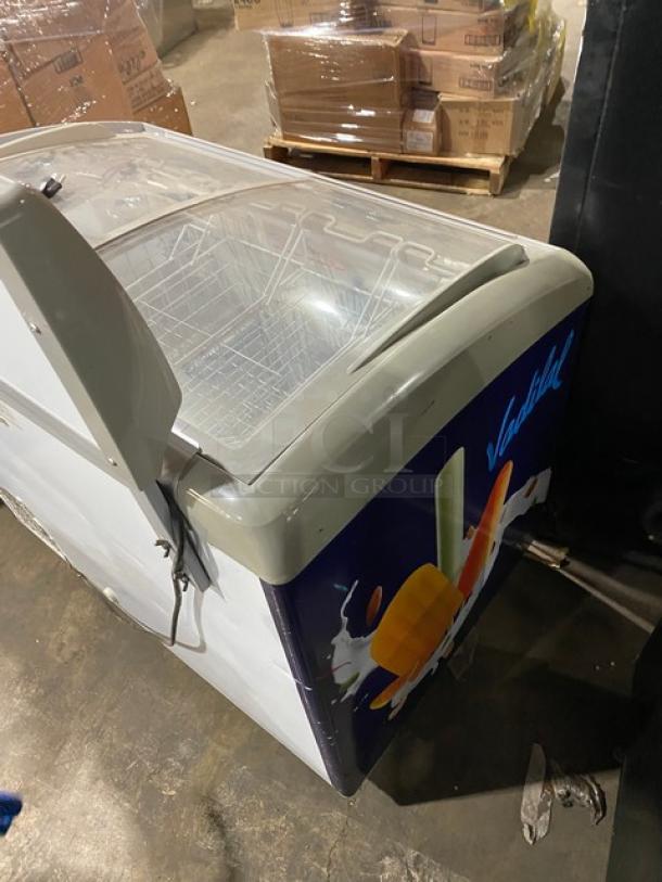 Excelente CF289 commercial curved top chest freezer with double sliding glass top, poly-coated wire baskets, on casters.