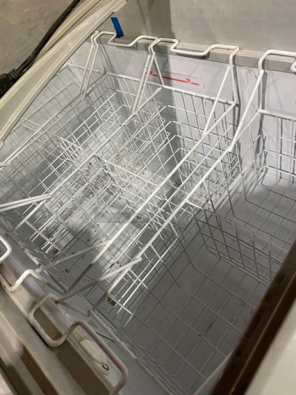 Excelente 2018 model CF289 commercial chest freezer with curved double sliding glass top, poly coated wire baskets, on casters.