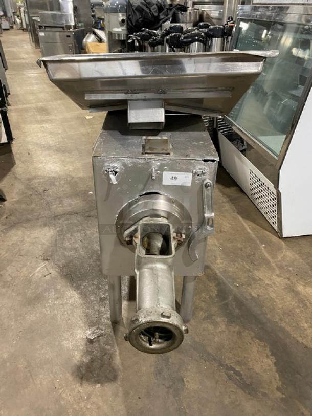 Hobart commercial electric meat chopper, free-standing, heavy-duty, on legs, visible wear, Model 49 label attached.